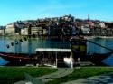 Ribeira vista desde Gaia. En primer plano, barco "rabelo"